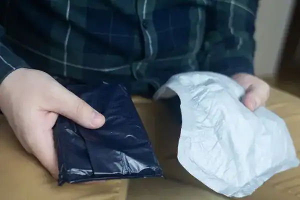 image of man holding stool incontinence Gloucester products